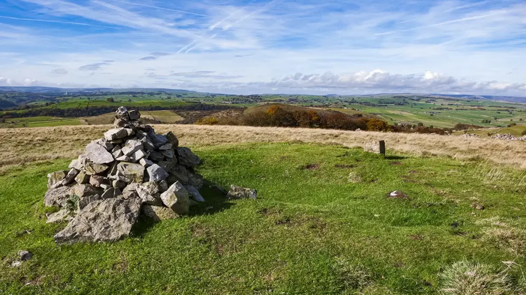 A cairn sits atop the Tumulus on Longstone Moor