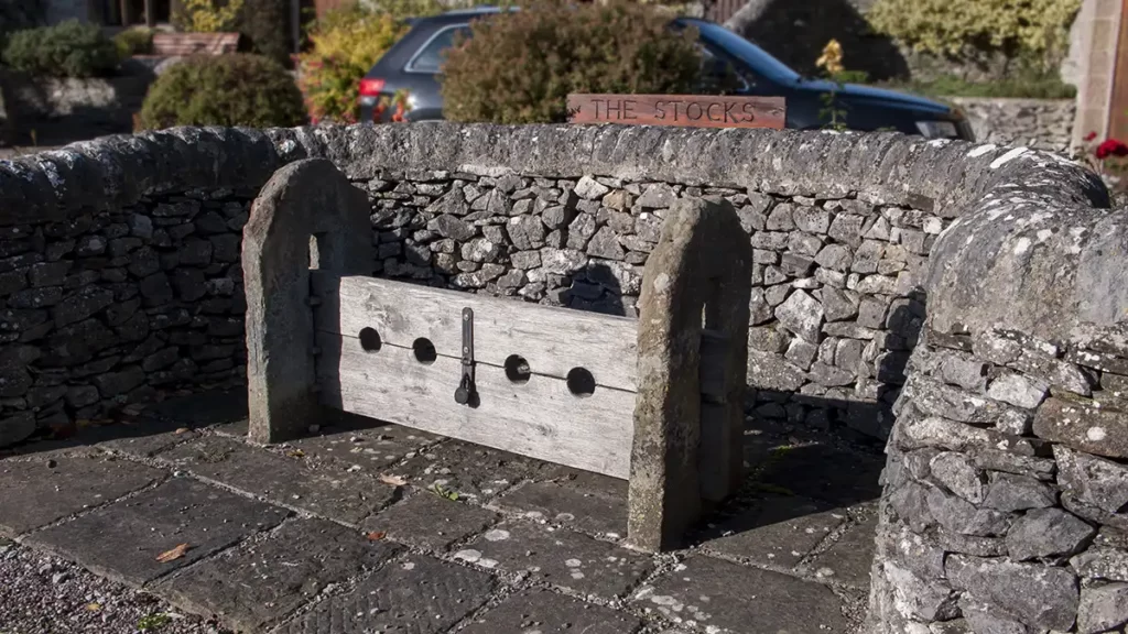 Old stocks displayed outside the village of Little Longstone